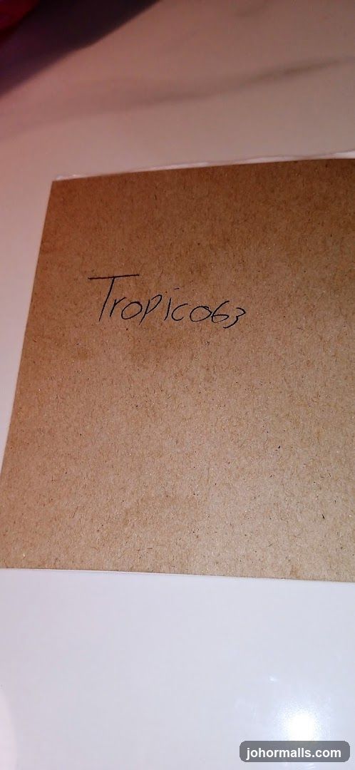 Handwritten text on cardboard
