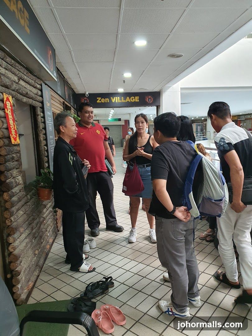 People gathered outside a shop