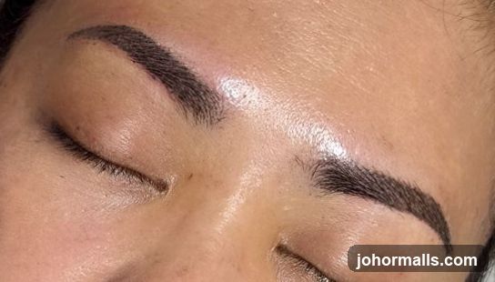 Close-up of freshly microbladed eyebrows