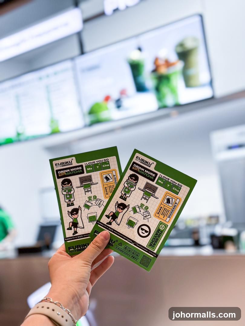 Hand holding promotional cards