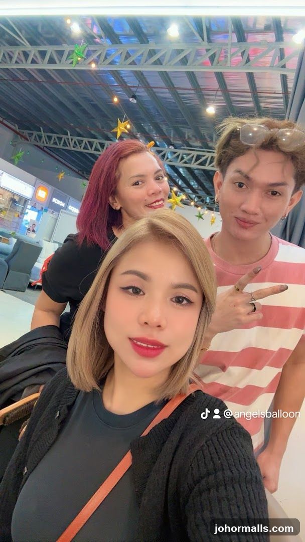 Three people posing for a selfie