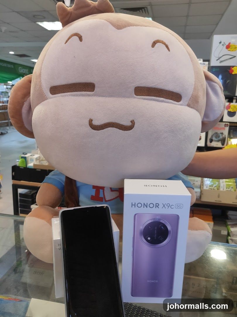 Giant Plush Monkey with Phone Display