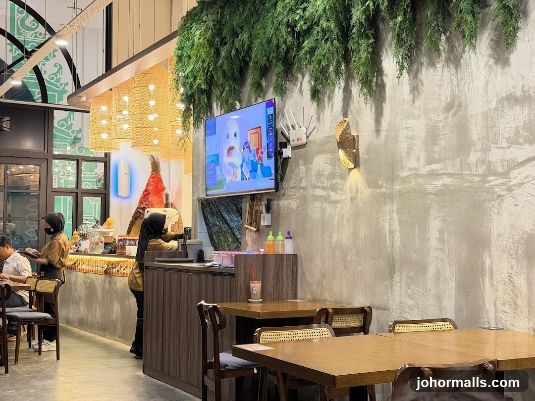 Restaurant Interior with Greenery and TV