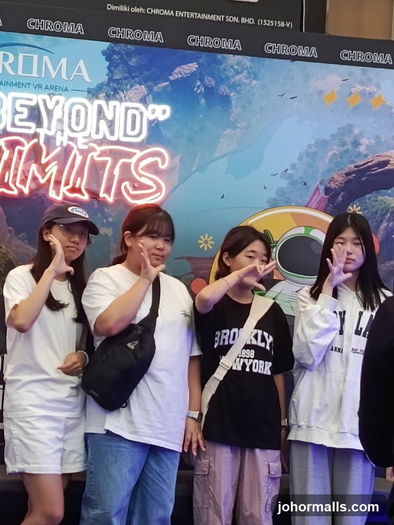 Group Posing in Front of Chroma VR Arena Banner