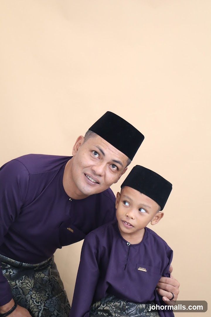 Father and son in traditional attire