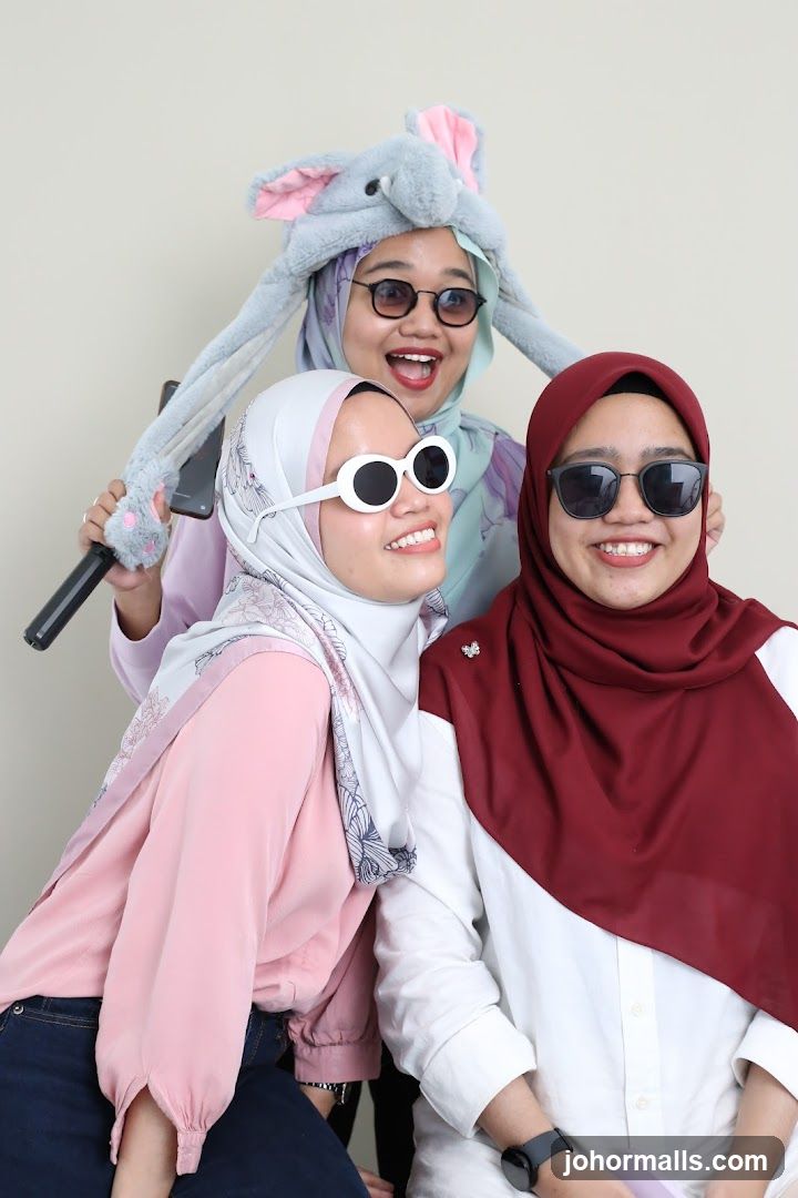 Three women posing for a photo
