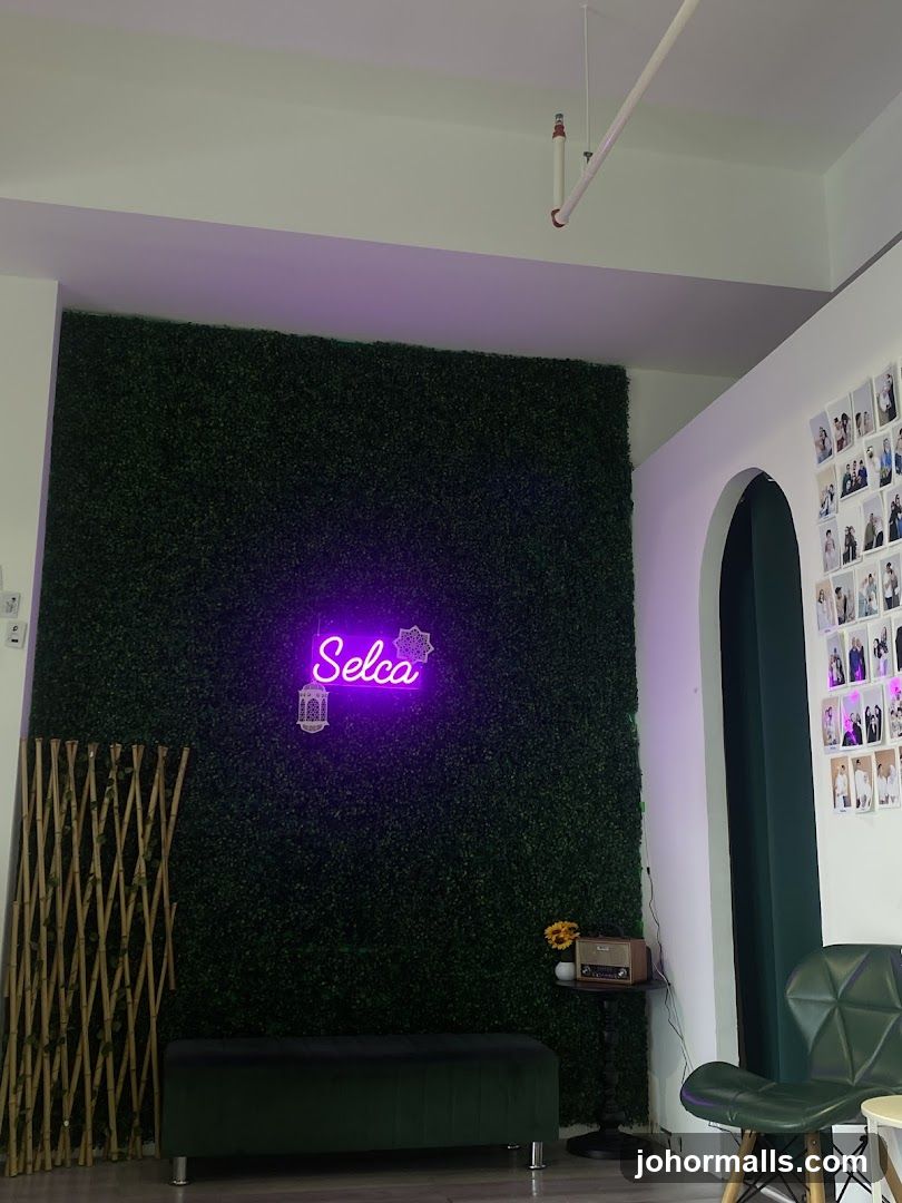 Interior of a room with a neon sign