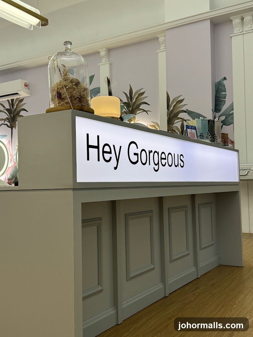 Reception Desk with "Hey Gorgeous" Sign