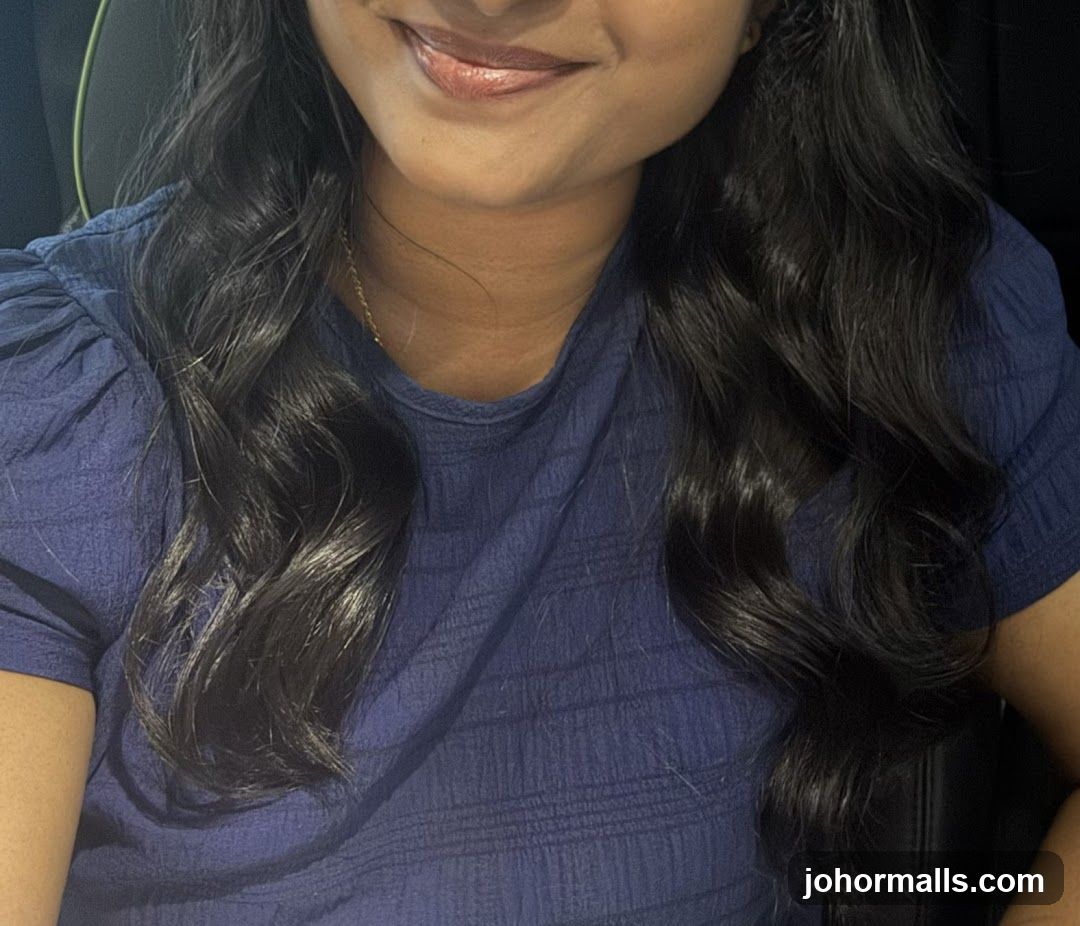 Woman with dark wavy hair