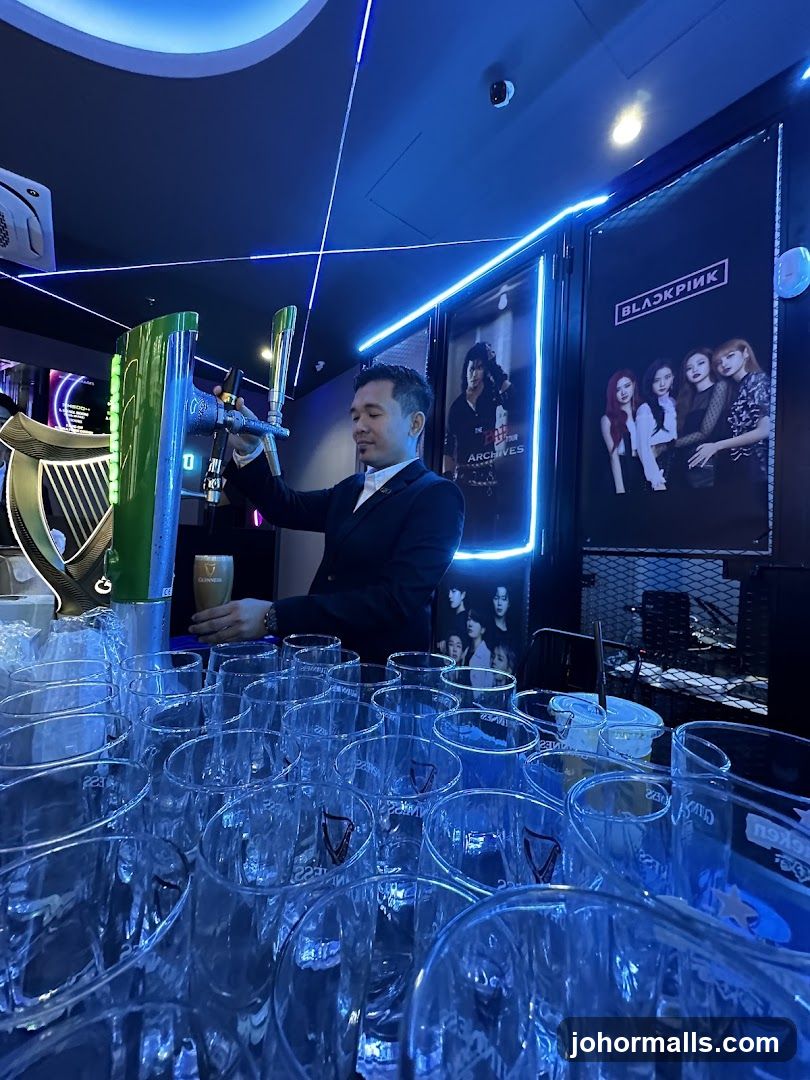 Bartender pouring Guinness