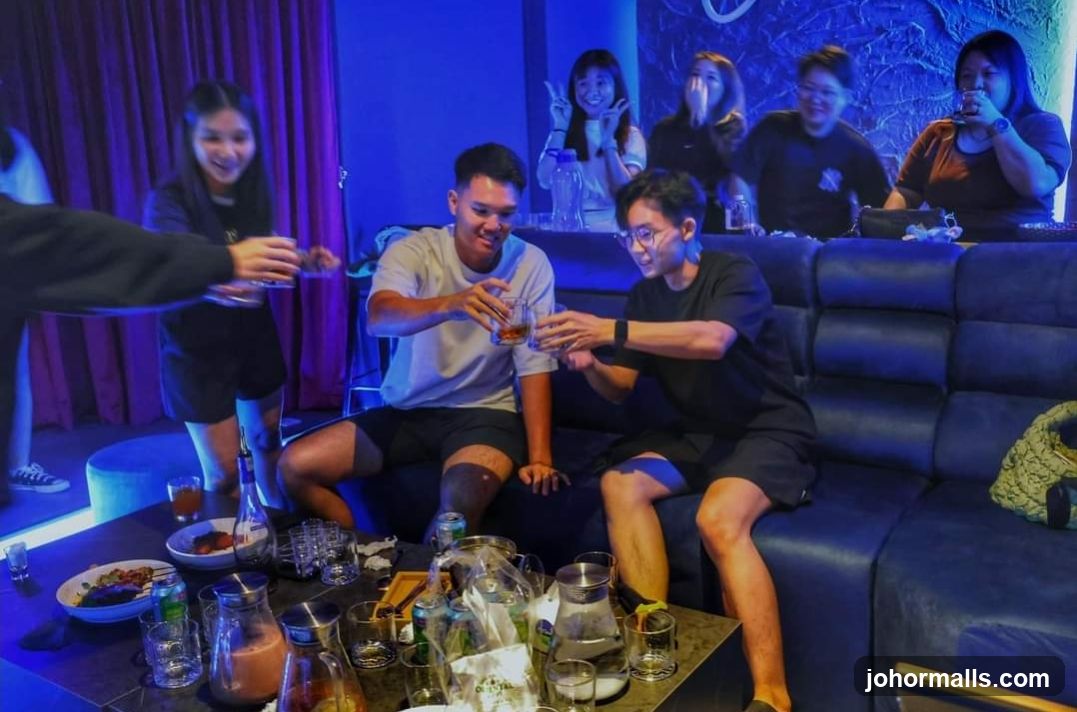 Friends toasting drinks in a dimly lit room