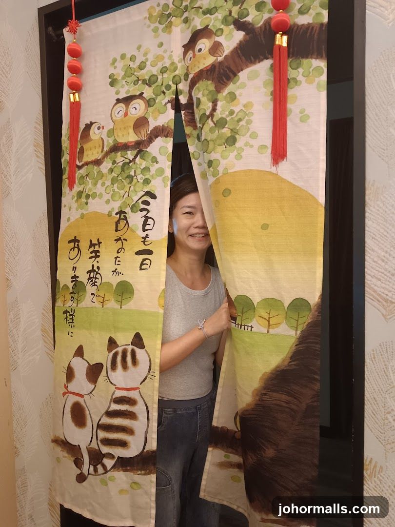 Woman peeking through a decorative curtain