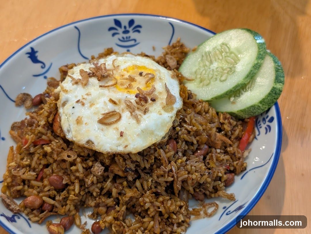 Nasi Goreng with Fried Egg and Cucumber Slices
