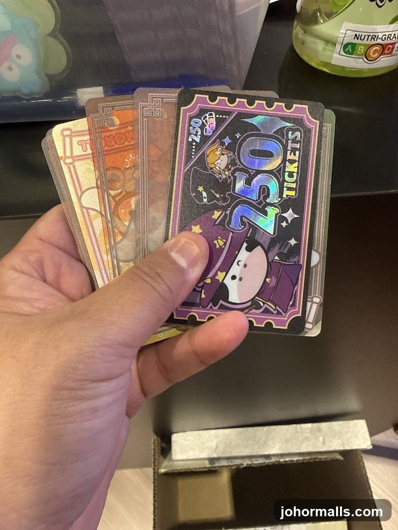 Hand holding collectible tickets