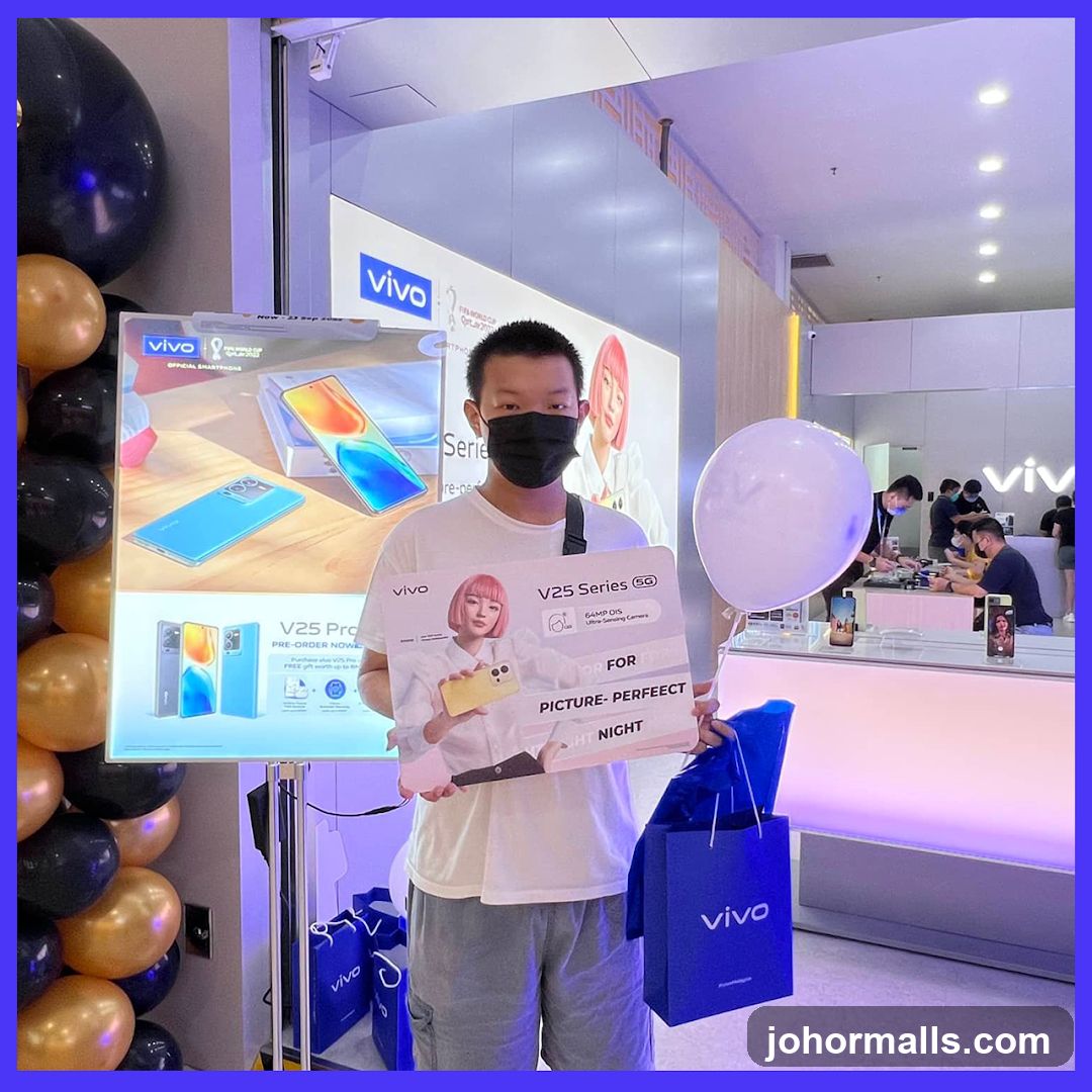 Man holding V25 Series 5G promotional cutout