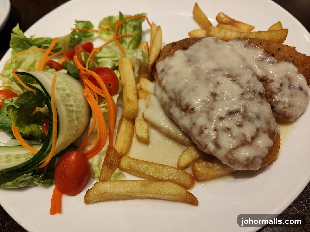 Breaded cutlets with cheese and fries