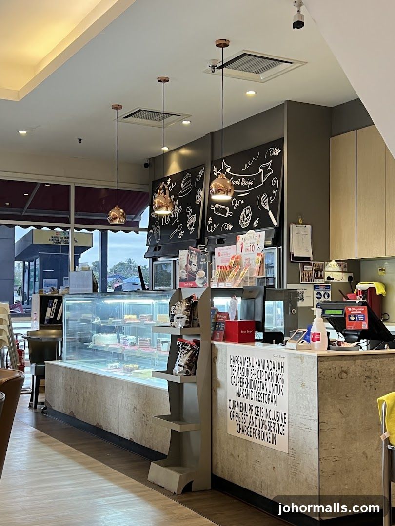 Cafe Interior with Cakes and Counter