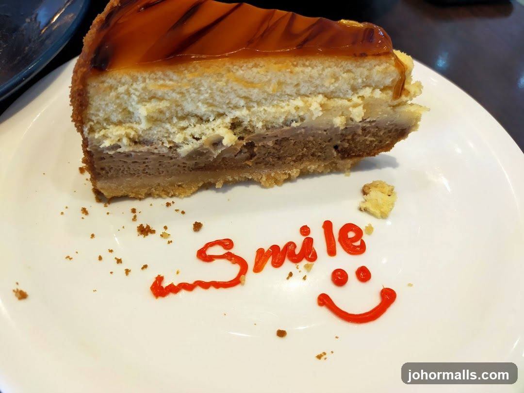 Cheesecake with Caramel Drizzle and Smile Decoration