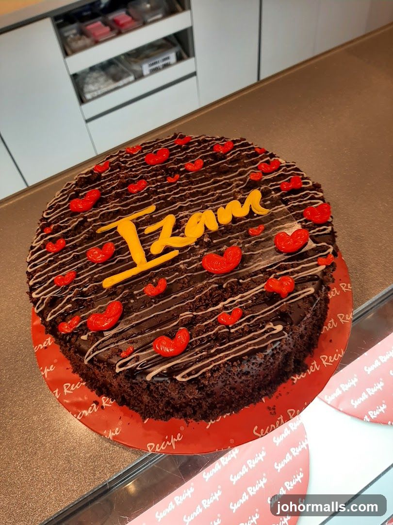 Chocolate Cake with "Izam" Written on Top