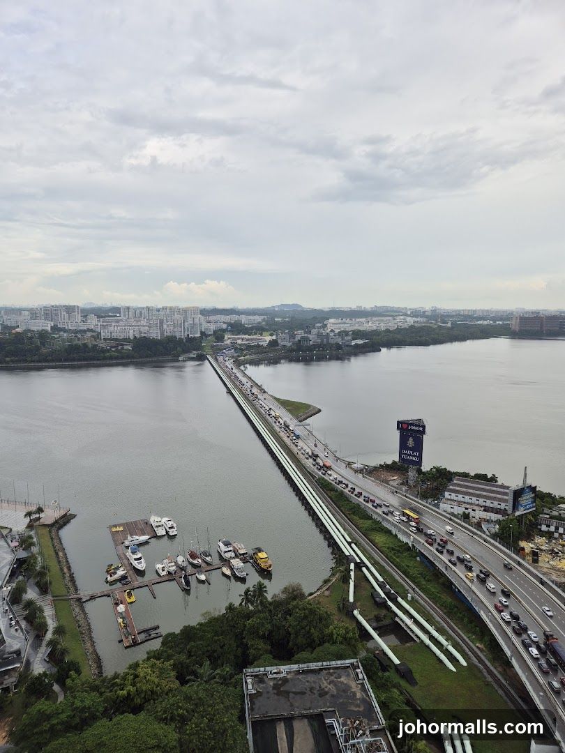 Aerial View of a Busy Causeway and Marina