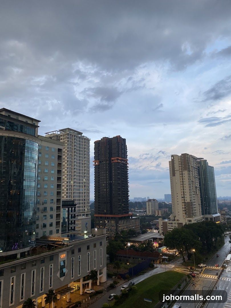 Cityscape with Tall Buildings and Cloudy Sky