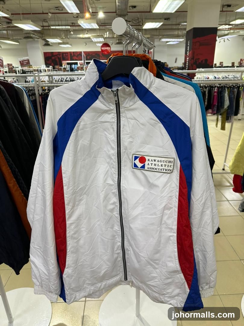 White athletic jacket with blue and red accents