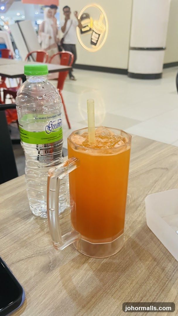 Orange Drink and Water Bottle