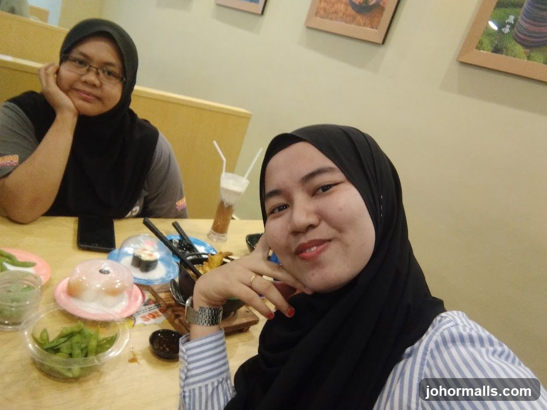 Two women at a sushi restaurant