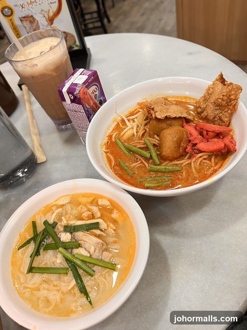 Two Bowls of Noodles and a Drink