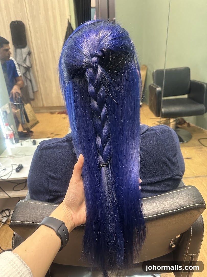 Woman with blue hair in a braid