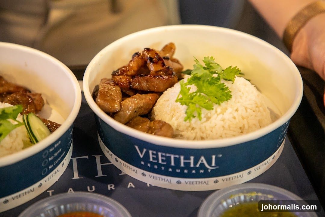 Takeaway Bowls of Rice and Meat