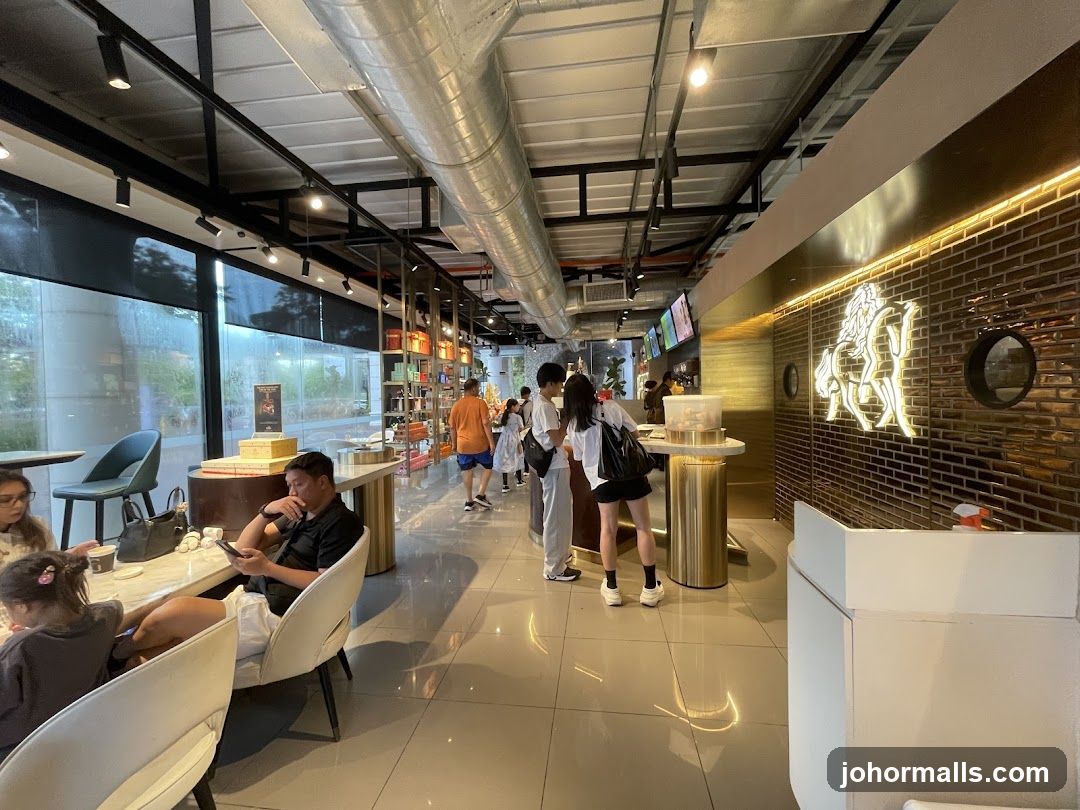 Interior of a modern cafe with seating and merchandise displays