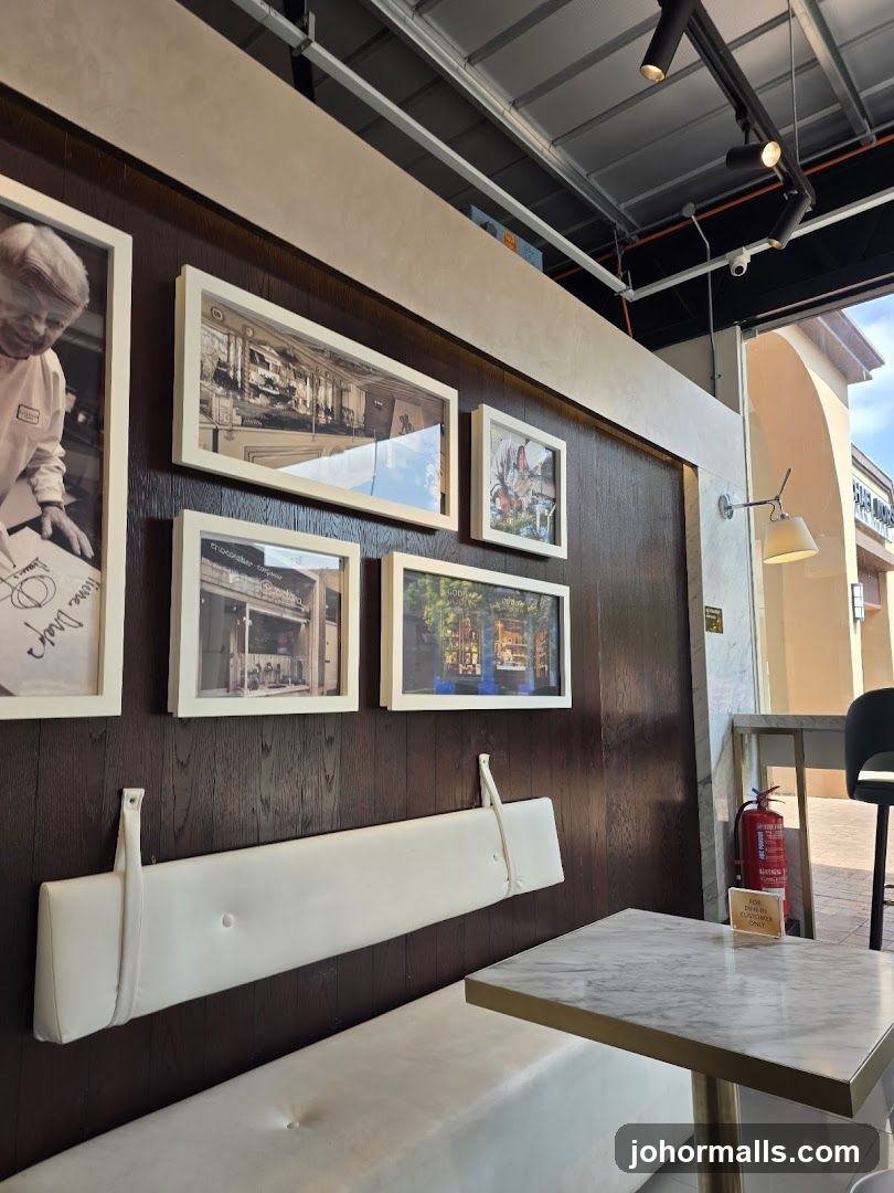 Interior of a cafe with framed photos and seating