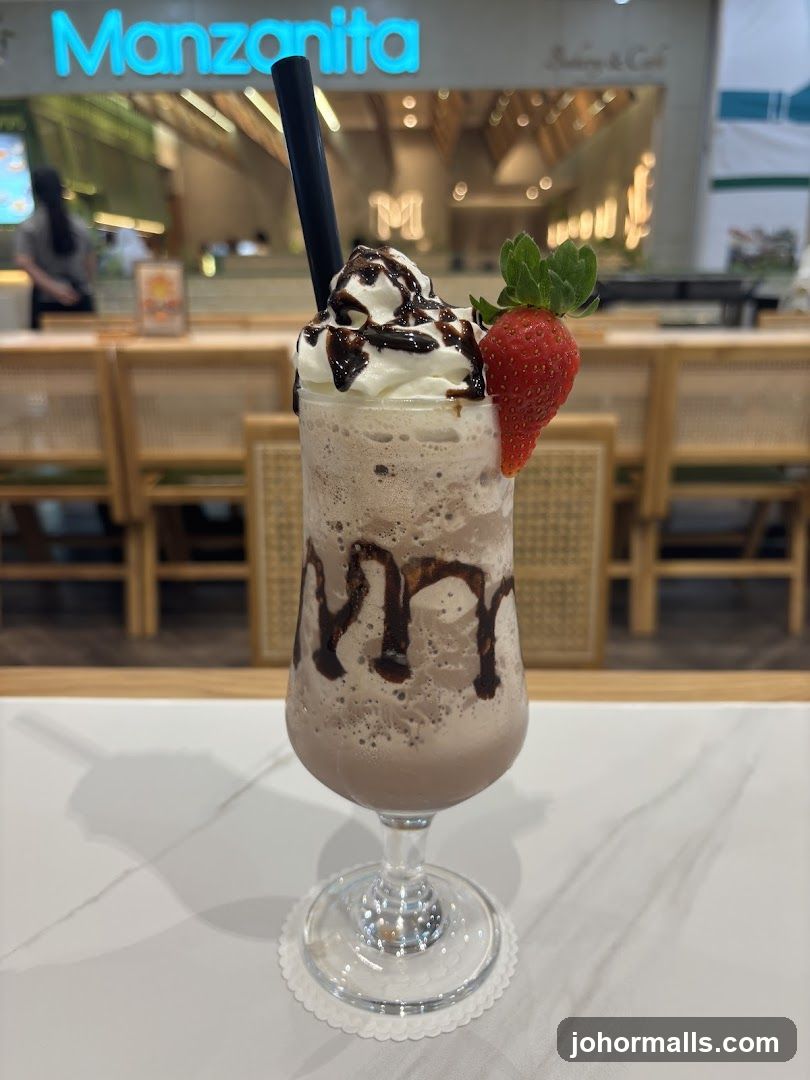 Chocolate Frappe with Whipped Cream and Strawberry