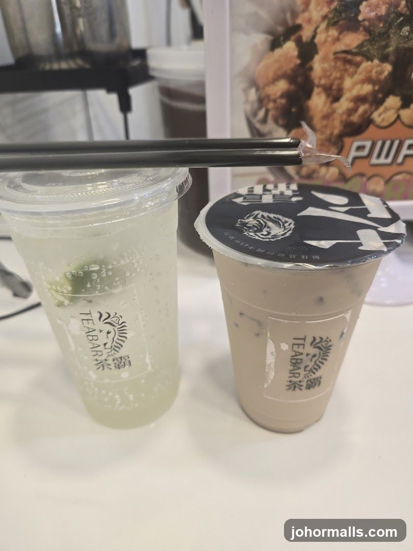 Two drinks with straws