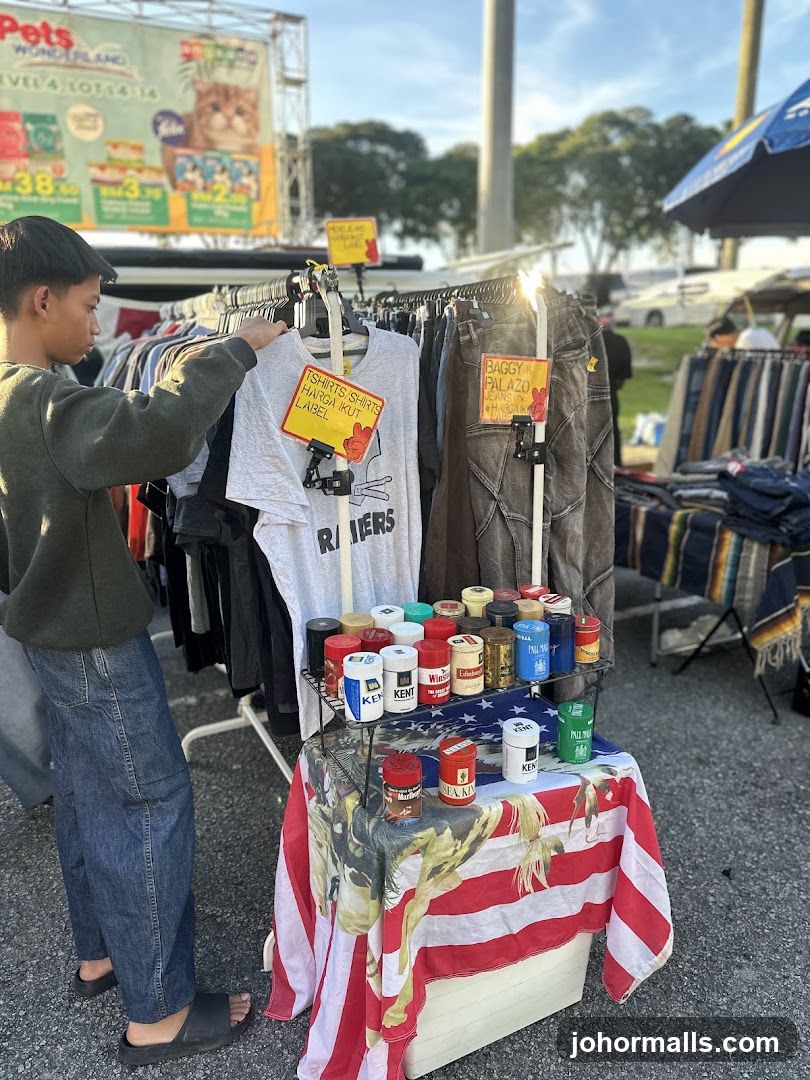 Outdoor Market Stall with Clothing and Collectibles