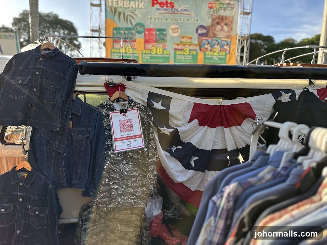 Clothing stall with promotional banner