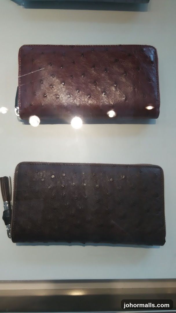 Two Ostrich Leather Wallets