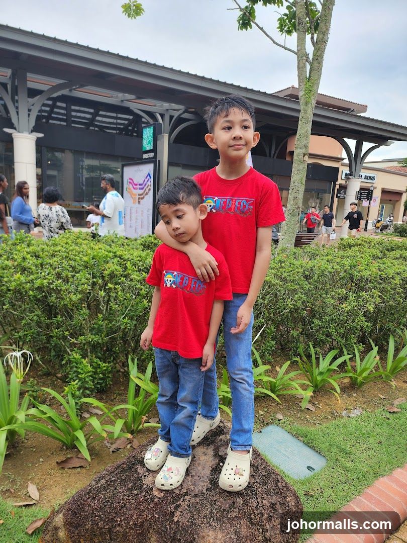 Two boys in red shirts