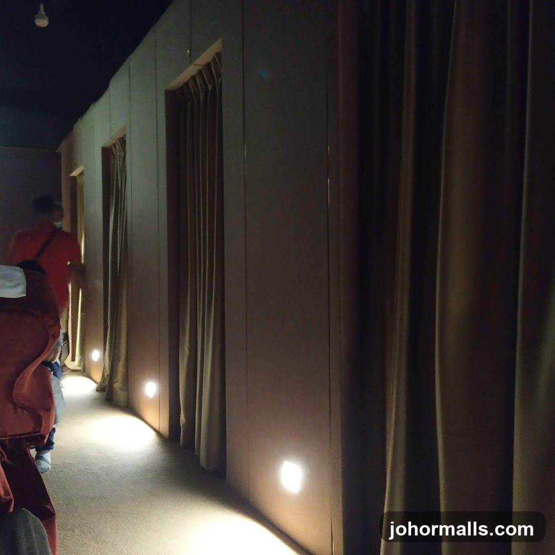 Hallway with Curtained Booths