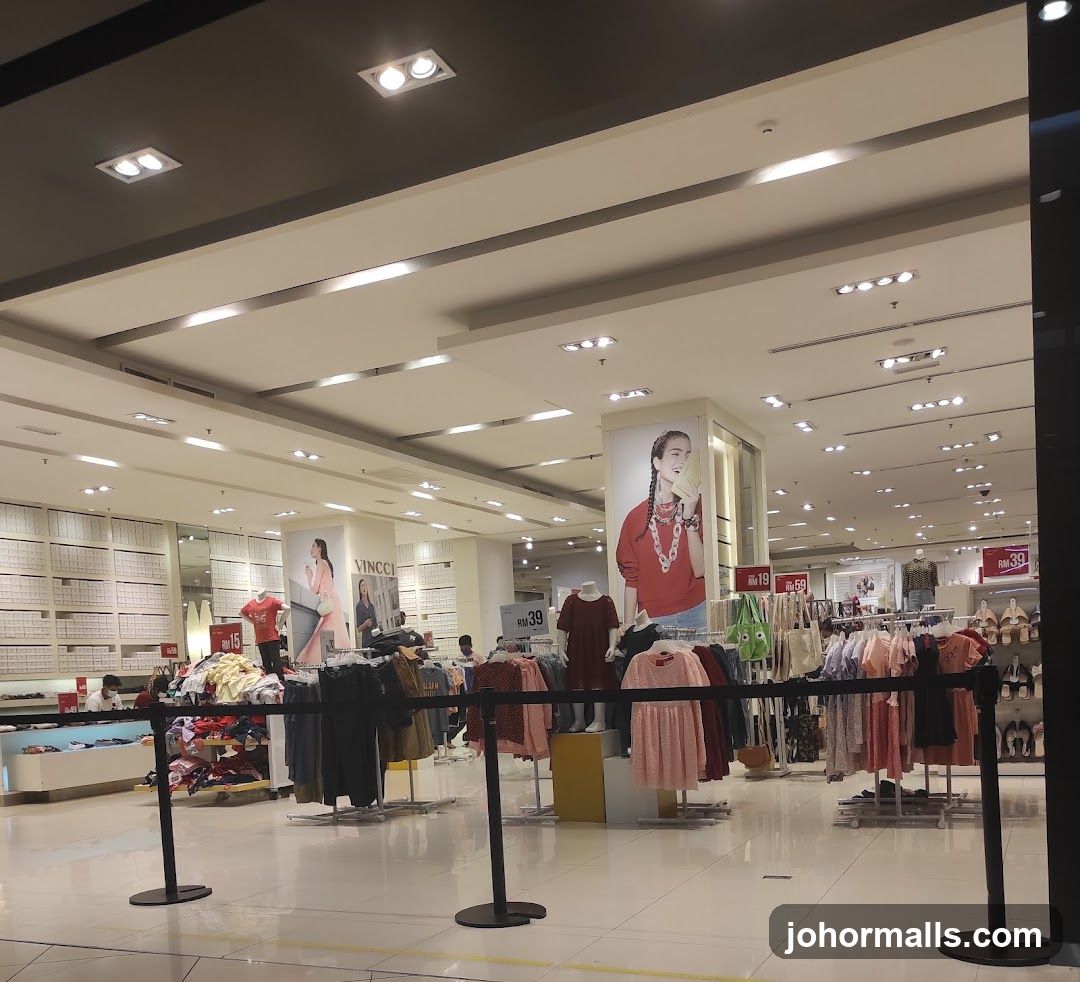 Clothing store interior with displays and mannequins