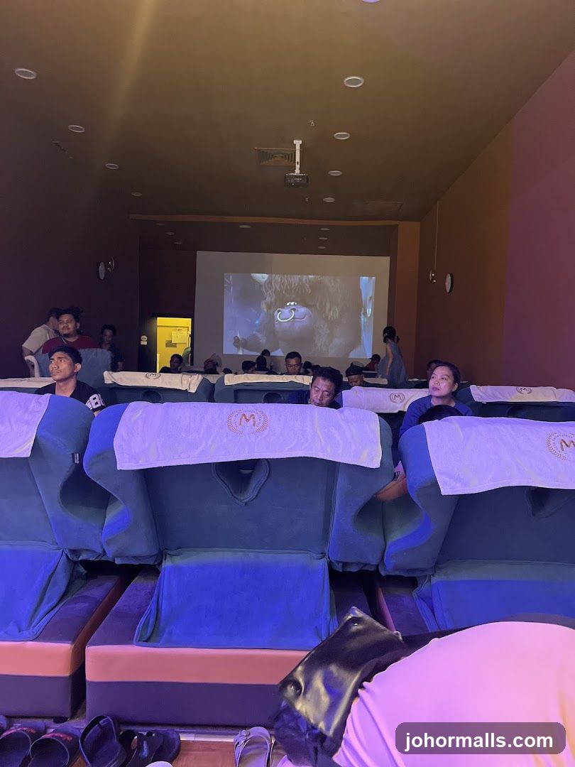 People watching a movie in a massage parlor