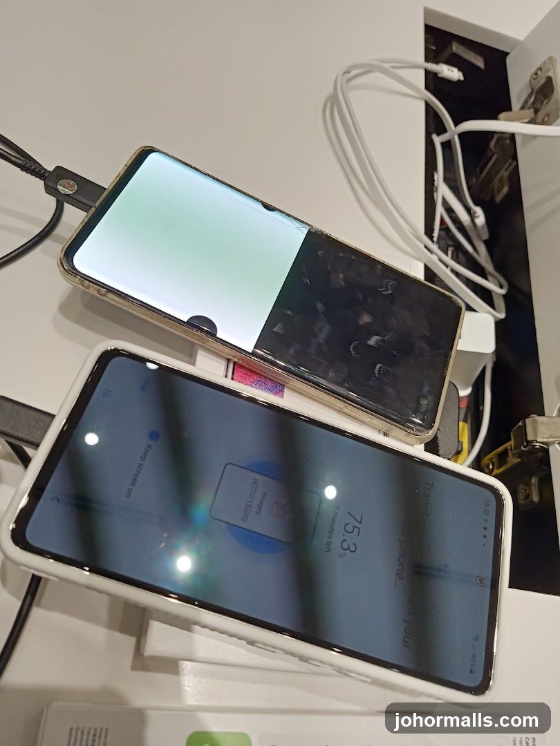 Two smartphones being charged