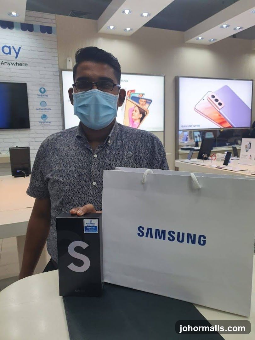 Man holding Samsung product