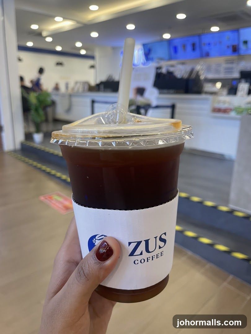 Iced Coffee with ZUS Coffee Sleeve