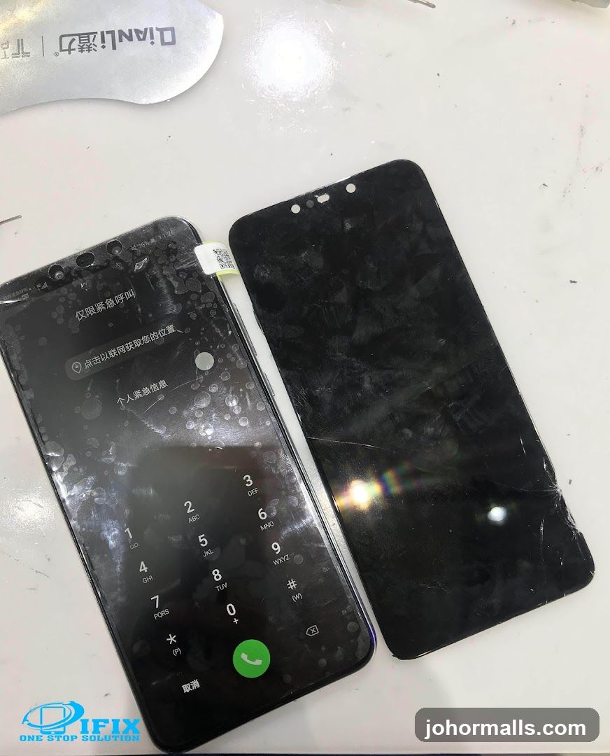 Two broken phone screens