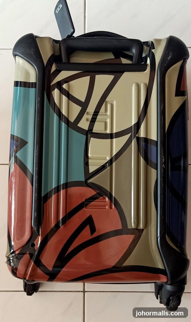 Tumi Luggage with Abstract Design