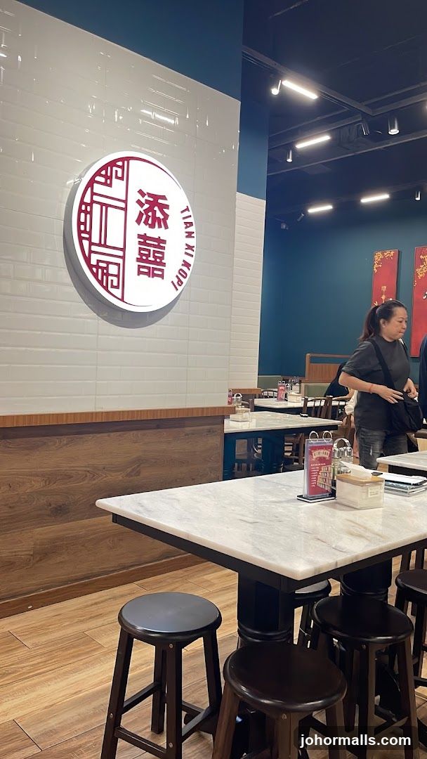 Interior of a cafe with a logo