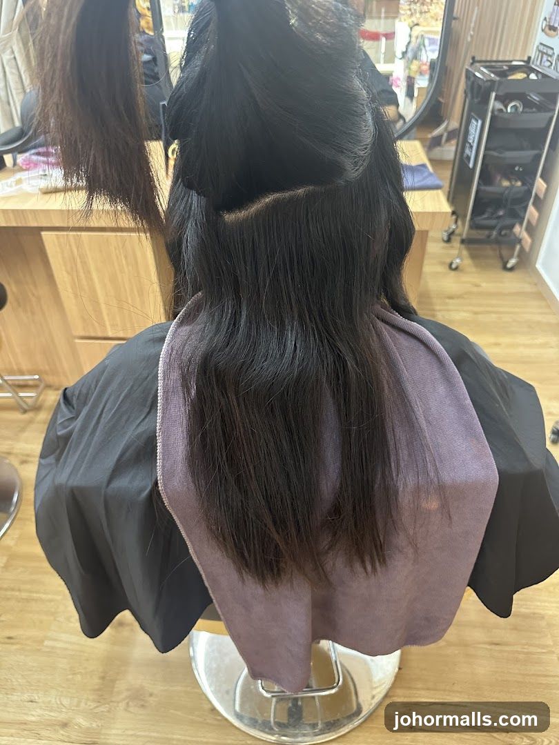 Hairdresser preparing to cut hair