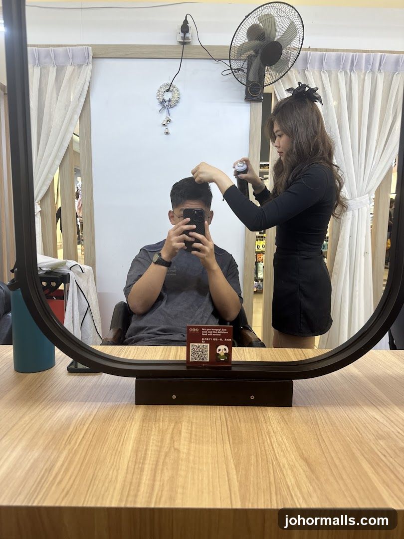 Hairdresser styling a client's hair